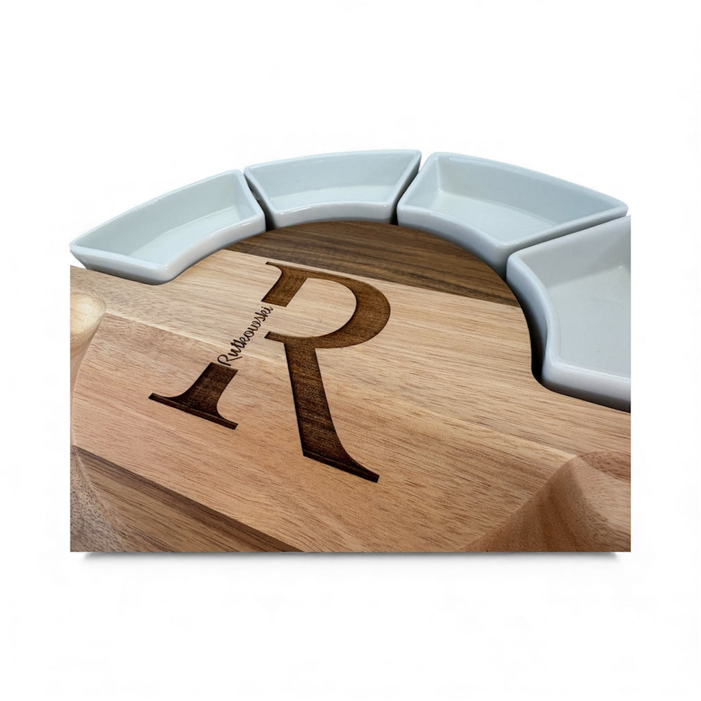 Wooden cutting board with engraving on a white background